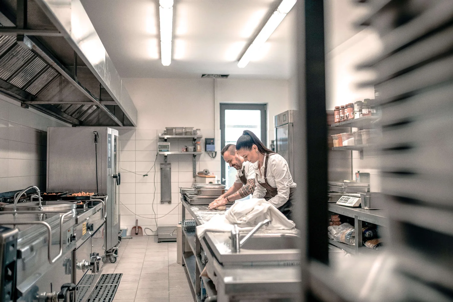 Chefs working together in a restaurant kitchen